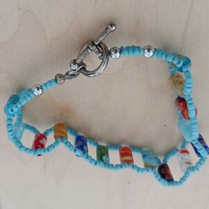 Handcrafted Light Blue Beaded Toggle Bracelet with Multicolor Glass Accents